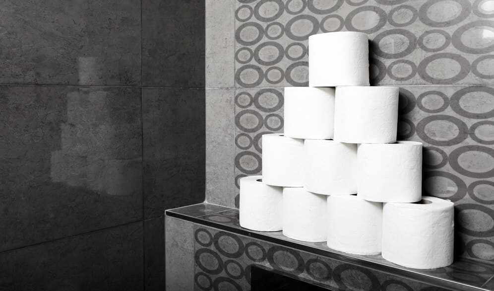 high-angle-stack-toilet-paper-rolls-shelf