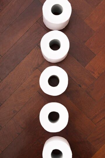 top-view-loose-toilet-paper-floor